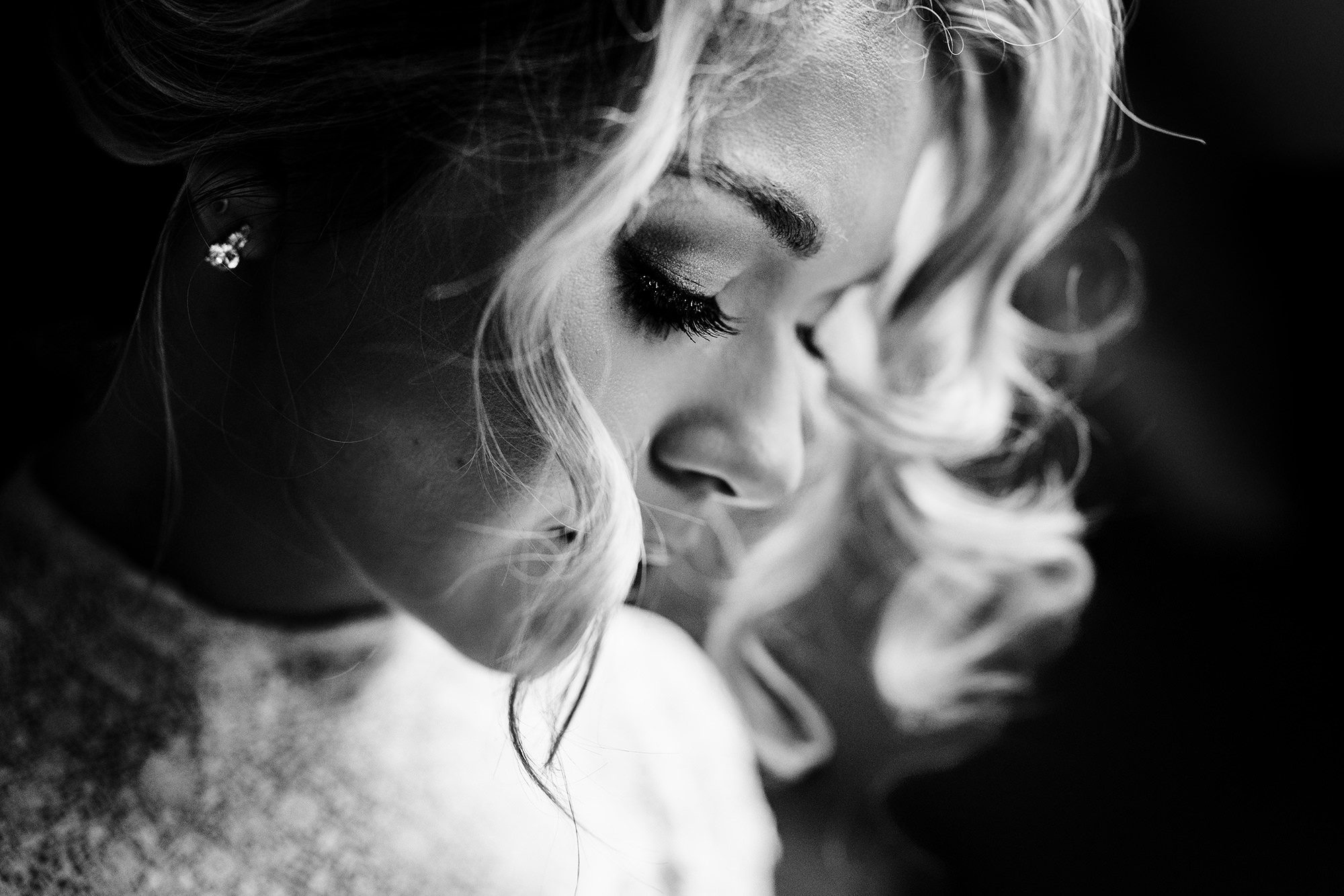 bride poses for her photo of wedding makeup