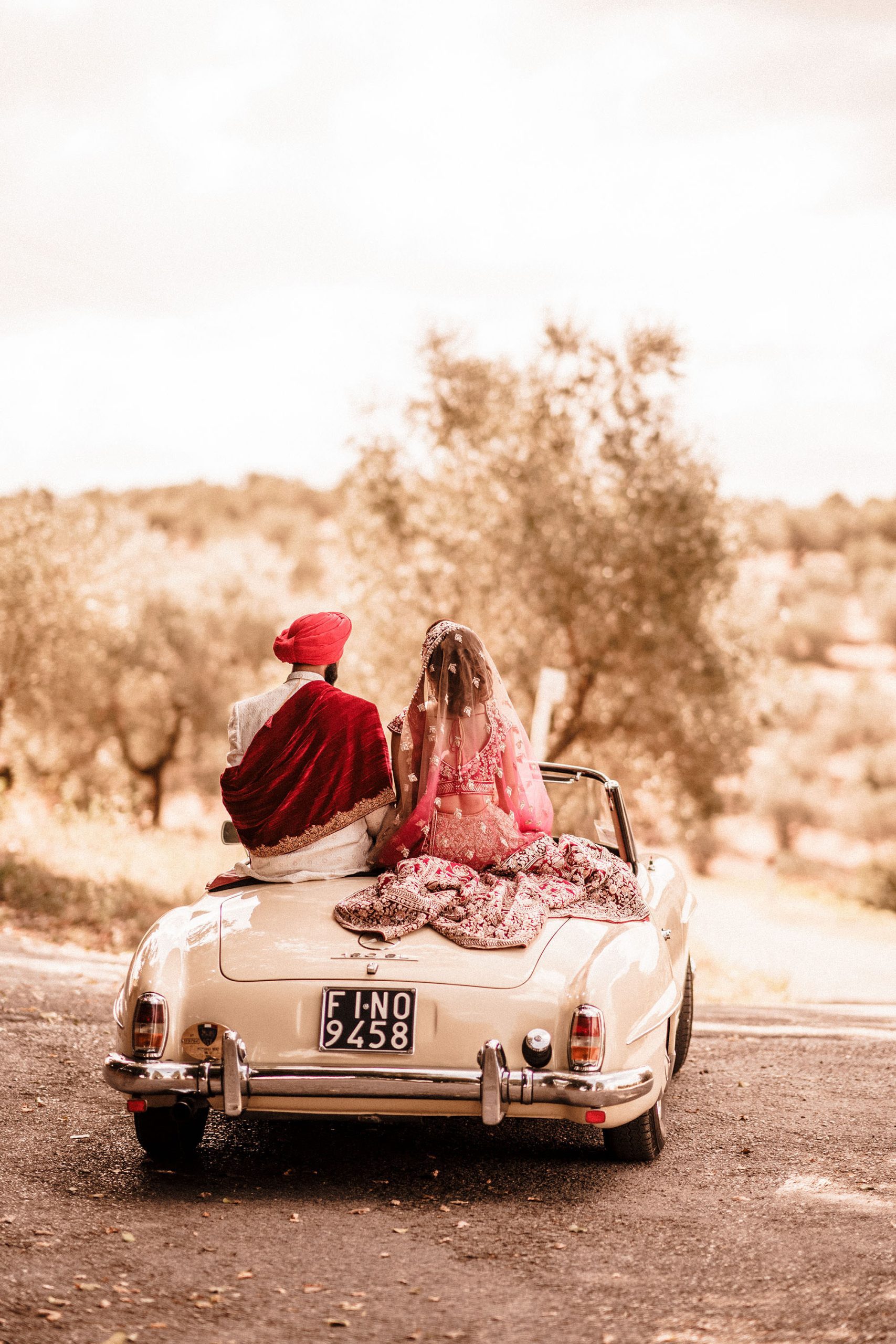 aisian wedding couple during photo shoot in artimino